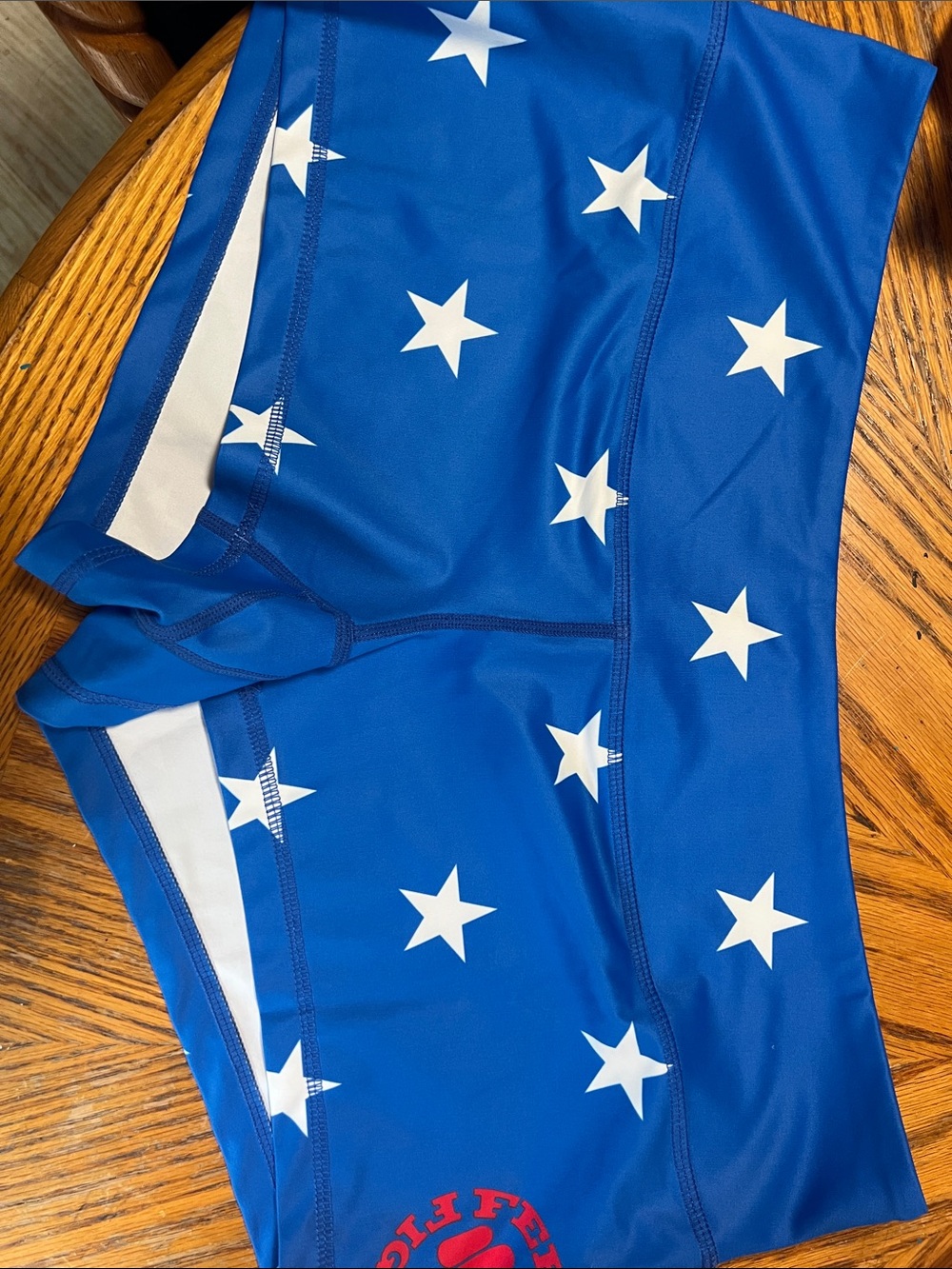 Feed Me Fight Me Blue Athletic Shorts with White Stars